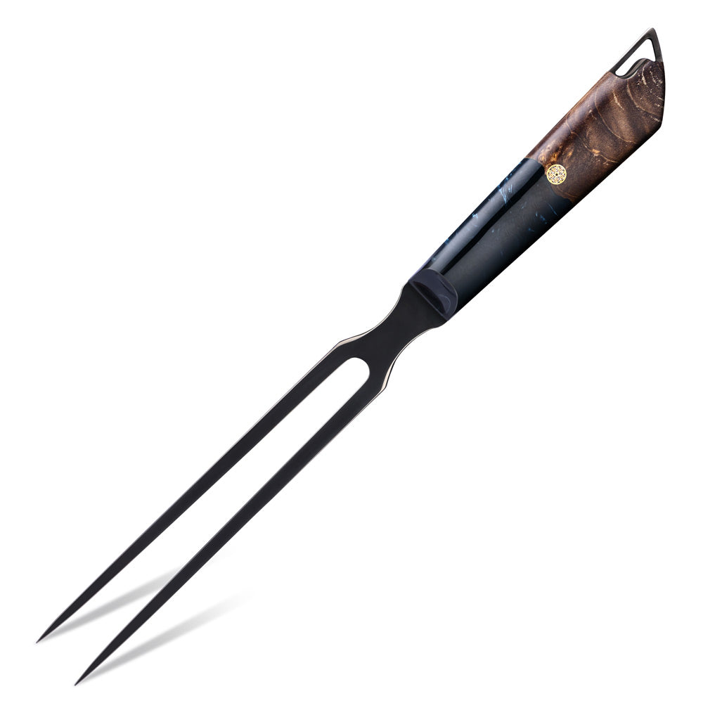 A black metal two-prong carving fork with a decorative handle featuring a dark wood grain pattern and a small gold emblem, shown on a plain white background.