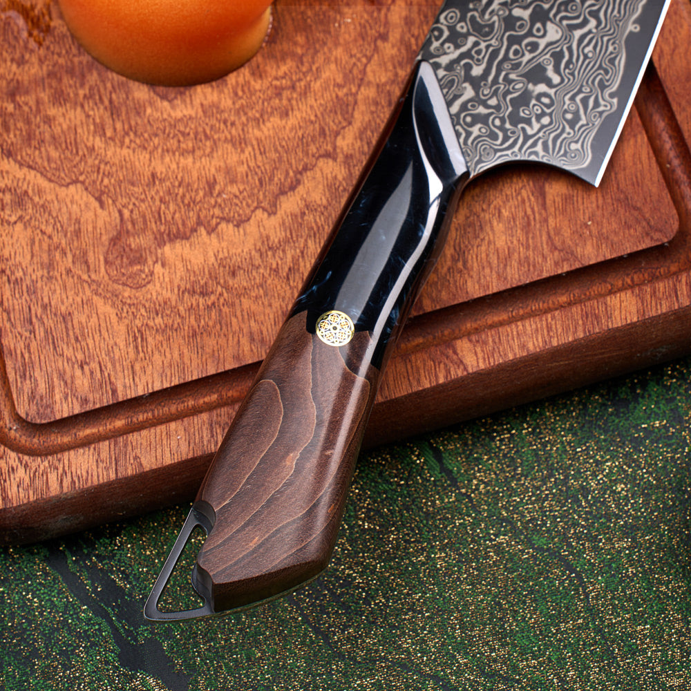 Decorative knife with wooden handle on a wooden cutting board